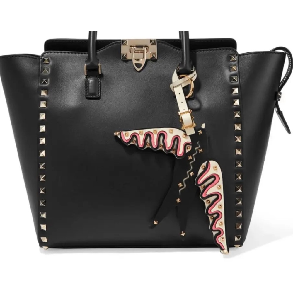 Valentino Garavani Rockstud Leather Swallow Bag Charm with Ornate Patterns. ♥️💝